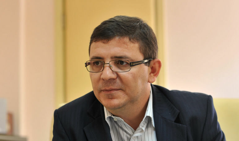 Рушен Риза