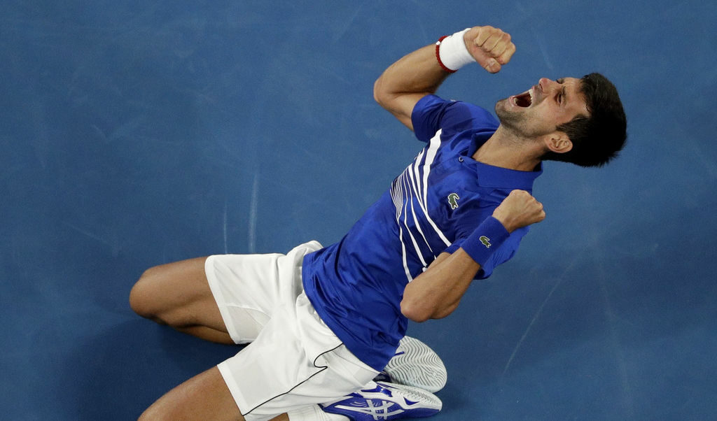 Радостта на Новак Джокович при триумфа му в Australian Open в началото на 2019 г.