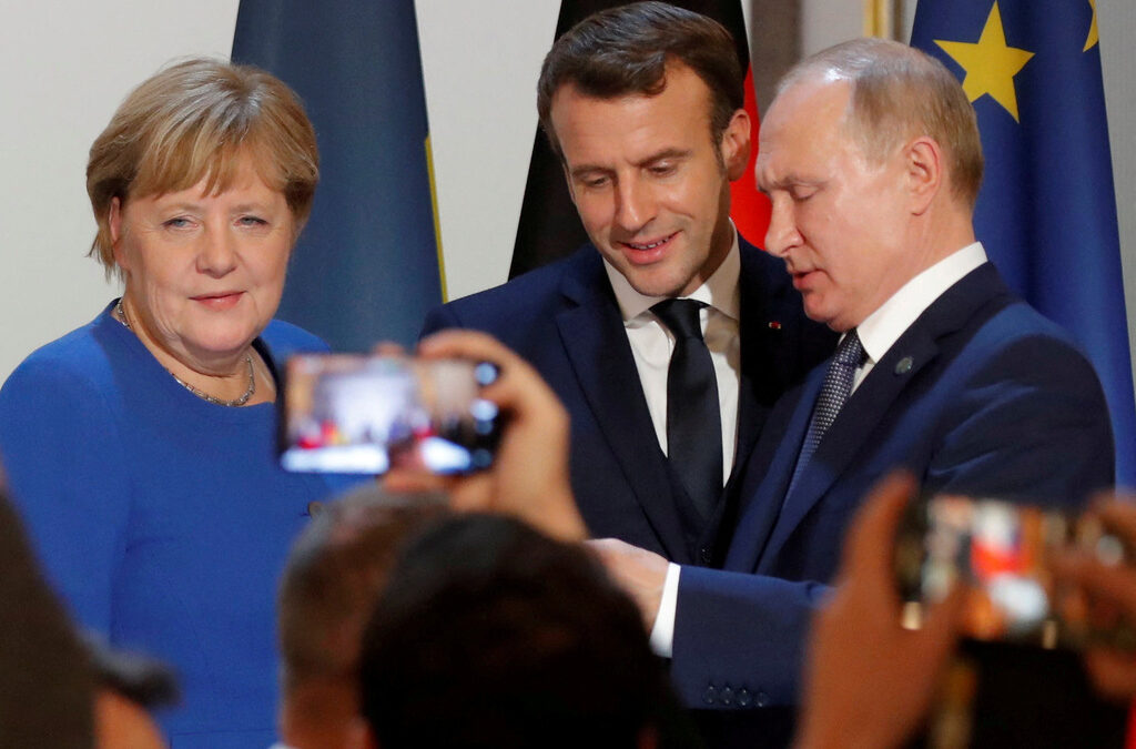 Ангела Меркел, Еманюел Макрон и Владимир Путин