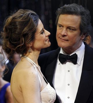 British actor Colin Firth, best actor nominee for his role in The King's Speech, and his wife Livia Giuggioli arrive at the 83rd Academy Awards in Hollywood