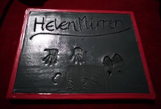 Actress Helen Mirren's hand and footprints are seen outside Grauman's Chinese Theatre in Hollywood