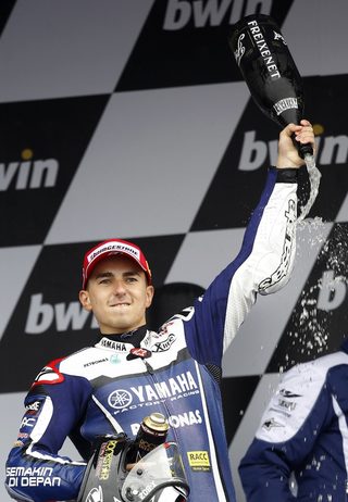 Yamaha MotoGP rider Lorenzo of Spain celebrates after winning the Spanish Grand Prix in Jerez