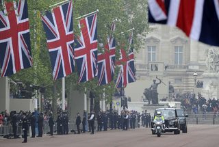 Rolls Royce carrying Kate Middleton and her father, Michael, travel to Westminster Abbey for Kate's marriage to Britain's Prince William in central London