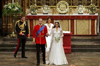 Britain's Prince William and his wife Catherine, Duchess of Cambridge, walk up the aisle after their wedding ceremony in Westminster Abbey, in central London