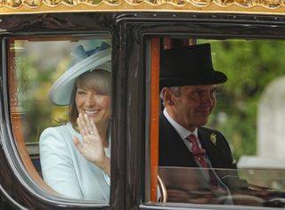 Carole and Michael Middleton, parents of Catherine, Duchess of Cambridge, travel with Britain's Prince Charles and Camilla, Duchess of Cornwall to Buckingham Palace in London