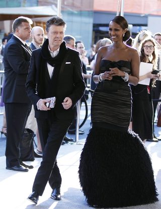 Singer Bowie arrives with his wife Iman to attend the CFDA fashion awards in New York