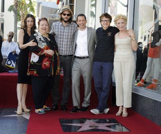 Cryer poses with co-stars Hinkle, Ferrell, Kutcher, Jones and Taylor during ceremony honoring Cryer with a star on Hollywood Walk of Fame in Los Angeles