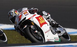 Honda MotoGP rider Aoyama of Japan rides during the Australian Grand Prix on Phillip Island