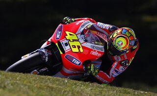 Ducati MotoGP rider Valentino Rossi of Italy rides during the first practice session of the Australian Grand Prix