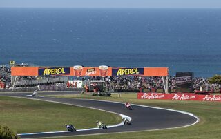 MotoGP riders take turn 8 during the third practice session of the Australian Grand Prix on Phillip Island near Melbourne