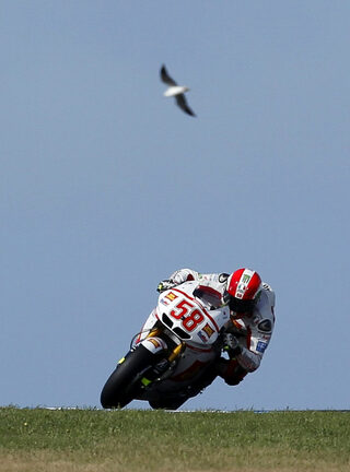 Honda MotoGP rider Marco Simoncelli of Italy rides during the Australian Grand Prix on Phillip Island near Melbourne