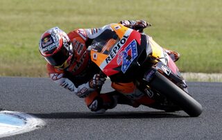 Honda MotoGP rider Casey Stoner of Australia rides during the Australian Grand Prix on Phillip Island near Melbourne