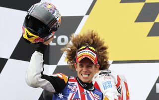 Honda MotoGP rider Stoner of Australia celebrates after winning the Australian Grand Prix on Phillip Island