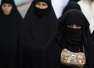 Muslim pilgrims make their way to perform prayers at the Grand Mosque upon their arrival in Mecca, during the annual haj pilgrimage in Mecca