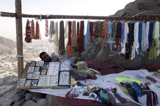 A vendor sells prayer beads during the annual haj pilgrimage in Mecca
