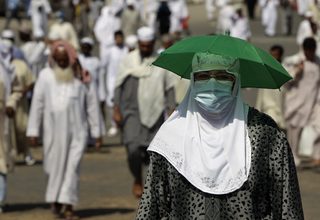 Muslim pilgrims make their way to perform prayers at the Grand Mosque upon their arrival in Mecca