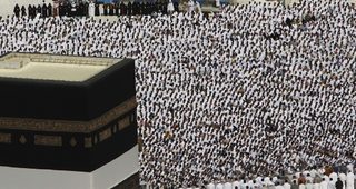 Muslim pilgrims attend Friday prayers at the Grand mosque in Mecca