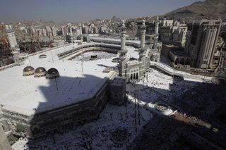 Muslim pilgrims attend Friday prayers at the Grand mosque in Mecca