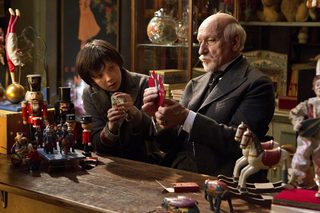 Asa Butterfield and Ben Kinglsey are shown in a scene from "Hugo" in this publicity photo