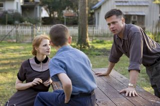Publicity photo of actors Chastain, Sheridan and Pitt in scene from Oscar nominated film "The Tree of Life"