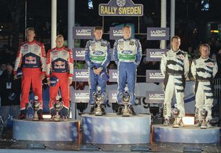 Winners stand on the podium for the WRC Rally of Sweden in Karlstad