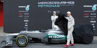 Mercedes Formula One drivers Schumacher of Germany and compatriot Rosberg unveil the F1 Mercedes W03 during the presentation at Circuit de Catalunya racetrack in Montmelo, near Barcelona