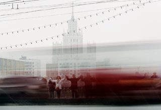 Opposition supporters take part in a protest rally called The White Ring by forming a human chain along the Garden Ring road in Moscow