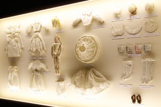 Fashion creations are displayed during the 'Louis Vuitton - Marc Jacobs: The Exhibition' at the Museem of Decorative Arts in Paris