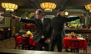 Publicity photo of actors Tommy Lee Jones and Will Smith in "Men in Black 3"