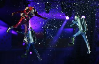 Performers take part in the opening ceremony of the London 2012 Olympics Games at the Olympic Stadium
