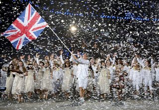 Britain's flag bearer Chris Hoy holds the national flag during the opening ceremony of the London 2012 Olympic Games