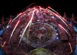 Fireworks explode over the Olympic Stadium during the opening ceremony of the London 2012 Olympic Games