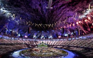 Fireworks explode over the Olympic Stadium during the opening ceremony of the London 2012 Olympic Games