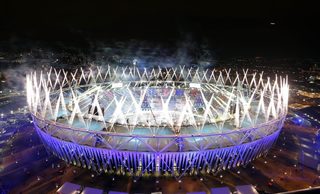 Fireworks explode over the Olympic Stadium during the opening ceremony of the London 2012 Olympic Games