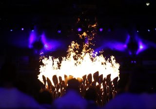 The Olympic cauldron is seen lit during the opening ceremony of the London 2012 Olympic Games