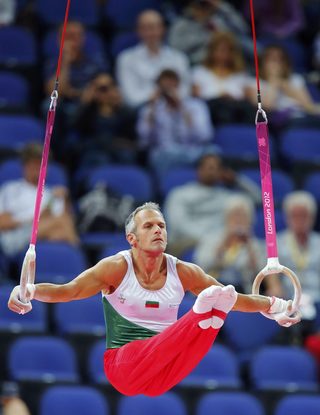 Jordan Jovtchev of Bulgaria competes on the rings during the men's gymnastics qualification in the North Greenwich Arena during the London 2012 Olympic Games