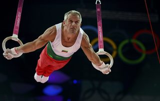 Jordan Jovtchev of Bulgaria competes on the rings during the men's gymnastics qualification in the North Greenwich Arena during the London 2012 Olympic Games
