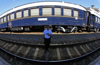 A security guard stands in front of the Orient Express at the main railway station in Bucharest