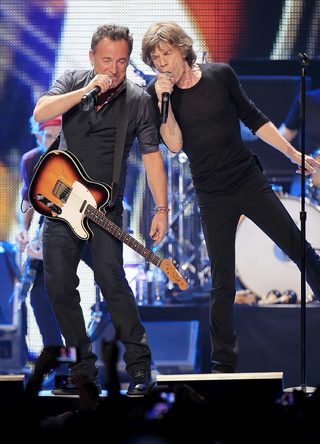 Mick Jagger and Bruce Springsteen perform onstage during the Rolling Stones final concert of their "50 and Counting Tour" in Newark