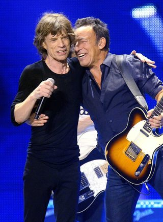 Mick Jagger and Bruce Springsteen perform onstage during the Rolling Stones final concert of their "50 and Counting Tour" in Newark