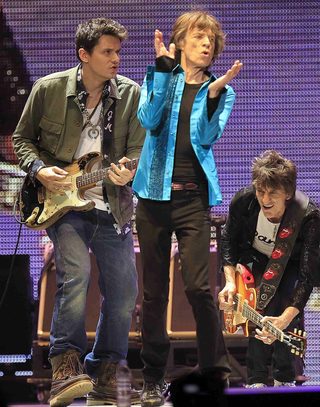 Mayer, Jagger and Wood perform onstage during the Rolling Stones final concert of their "50 and Counting Tour" in Newark