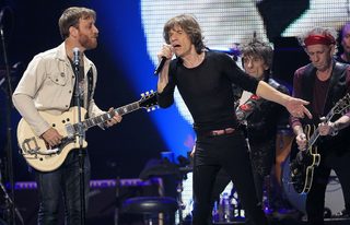 Auerbach and and Jagger perform onstage during the Rolling Stones final concert of their "50 and Counting Tour" in Newark