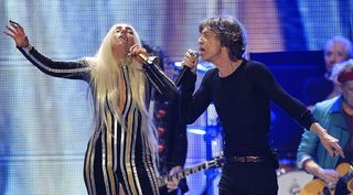 Lady Gaga and Mick Jagger perform onstage during the Rolling Stones final concert of their "50 and Counting Tour" in Newark