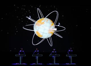 German electronic band Kraftwerk perform with 3d stage set at the Tate Modern in London