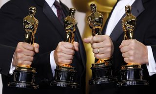 Guillaume Rocheron, Bill Westenhofer, Erik-Jan De Boer and Donald R. Elliott pose with their Oscars for best Visual Effects for "Life of Pi" at the 85th Academy Awards in Hollywood
