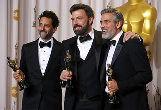 The producers of "Argo pose with their awards backstage at the 85th Academy Awards in Hollywood