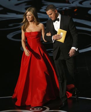 Presenters Jennifer Aniston and Channing Tatum take the stage at the 85th Academy Awards in Hollywood