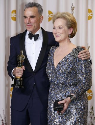 Daniel Day Lewis poses with Meryl Streep after he won the Oscar for best actor for his role in "Lincoln" at the 85th Academy Awards in Hollywood