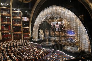U.S. first lady Michelle Obama announces the winner of the best picture Oscar via video link at the 85th Academy Awards in Hollywood