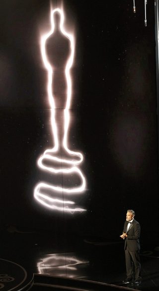 George Clooney introduces the "In Memorium" segment honoring actors who died in the past year at the 85th Academy Awards in Hollywood